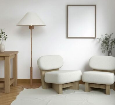 A calm and welcoming therapy waiting room with two white chairs, warm natural light, and soft natural tone